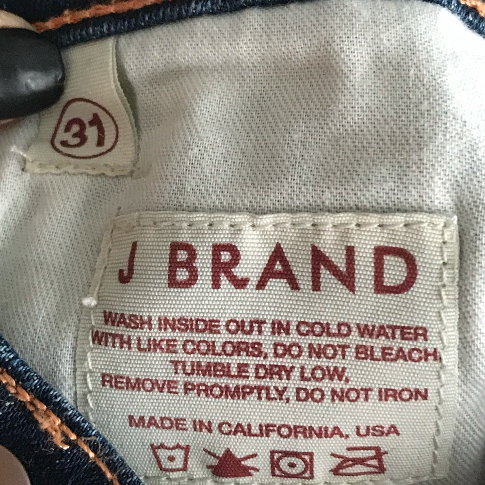 J Brand dark blue jeans.